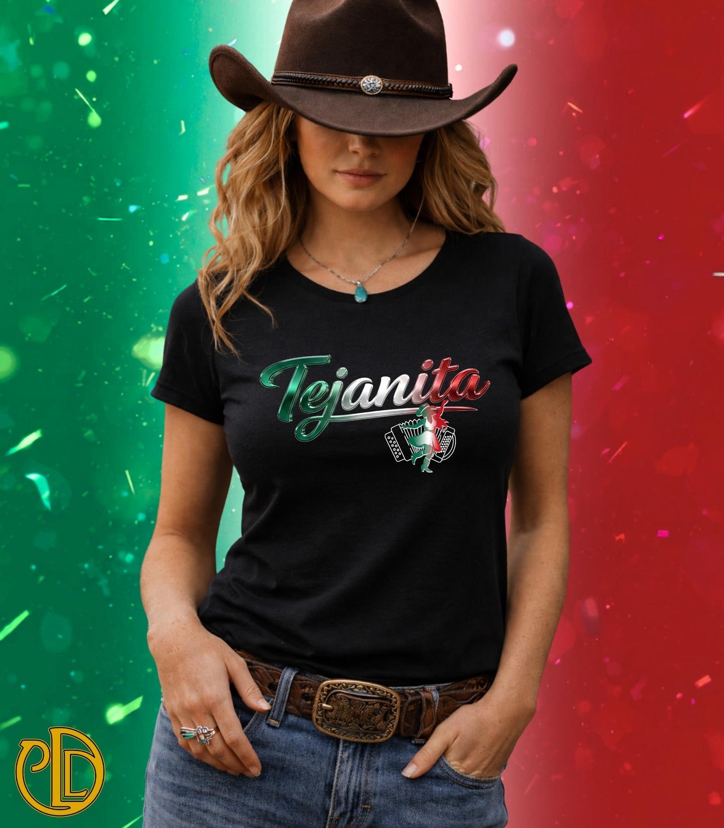 Person wearing a black 'Tejanita' t-shirt with a cowboy hat and belt against a colorful background.